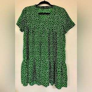 Shein brand XS green with white print, short sleeve, V neck and ruffle hem dress